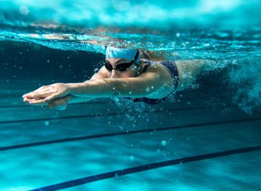 female swimmer swimming at the swimming pool